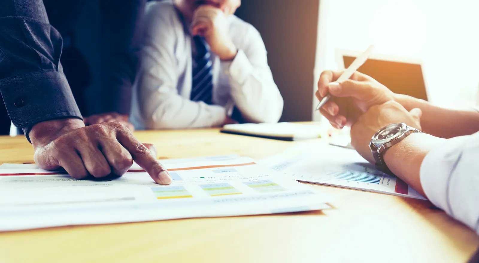 Business,Team,Discusses,Marketing,Plans,Or,Strategic,Plans,In,The