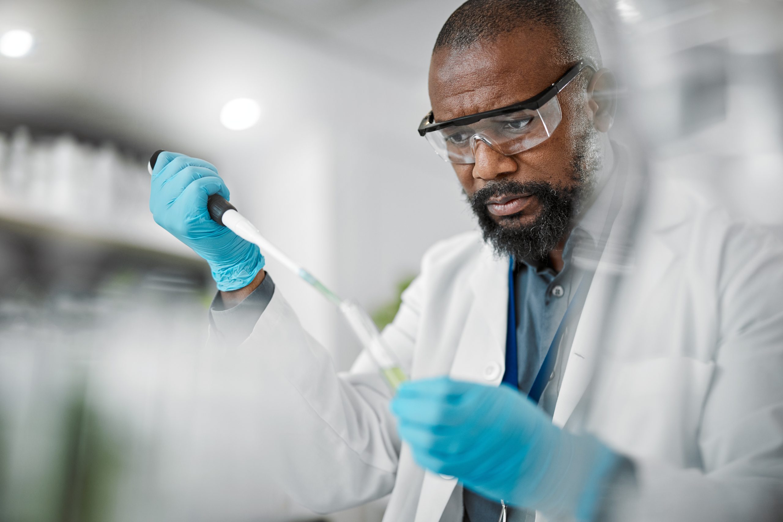 Scientist,Man,,Thinking,Or,Test,Tubes,In,Laboratory,Pharma,,Medical