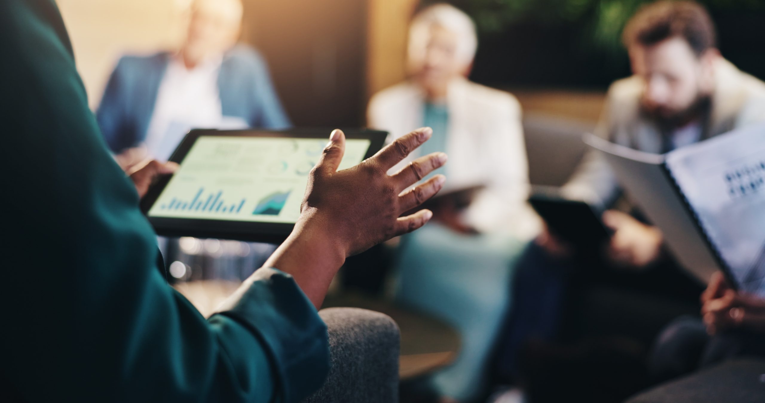 Business,Graphs,,Hands,And,Meeting,With,Tablet,Screen,For,Corporate