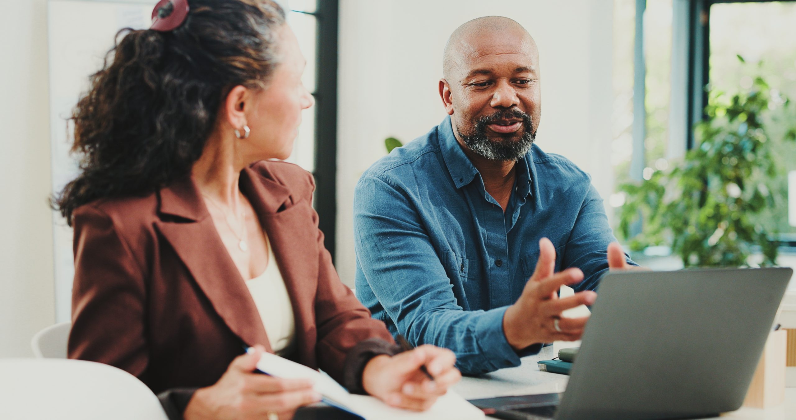 Business,People,,Notebook,And,Laptop,With,Discussion,In,Office,For